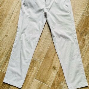 Men's White Lululemon Commission pants in WovenAir